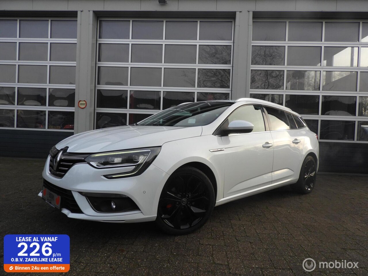 Renault Mégane Estate - 1.2 TCe Bose wit parelmoer - AutoWereld.nl