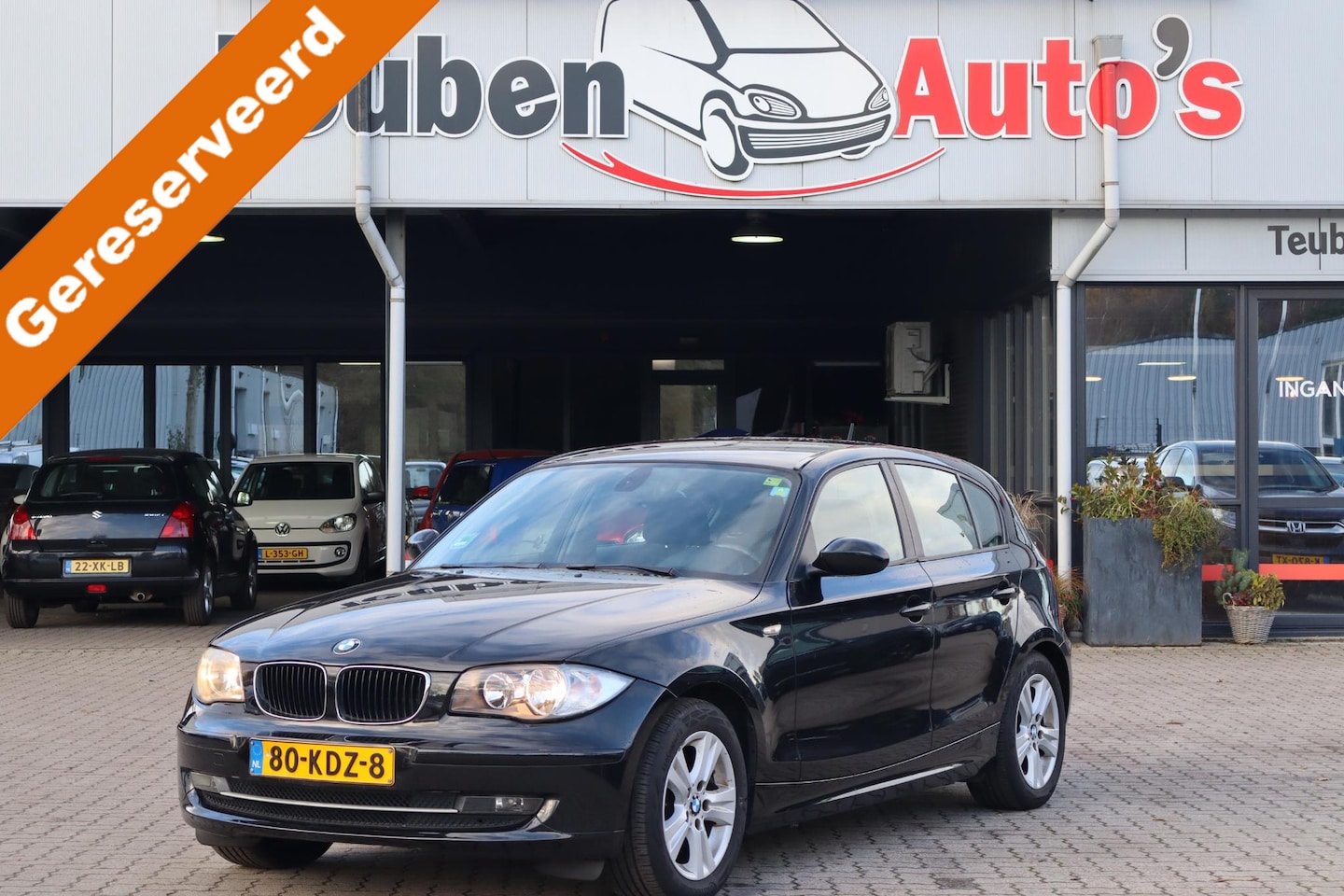 BMW 1-serie - 118i Business Line Climate control, Cruise control, Lichtmetalen wielen, Elektrische ramen - AutoWereld.nl