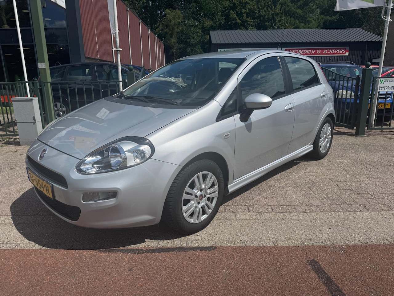 Fiat Punto Evo - 1.3 DIESEL airco, elektr ramen, trekhaak, APK 03-2026 - AutoWereld.nl