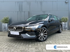 Volvo V60 - 2.0 T6 Plug-in hybrid AWD Essential Bright | Trekhaak | Leder | Climate pack | BLIS | Pilo