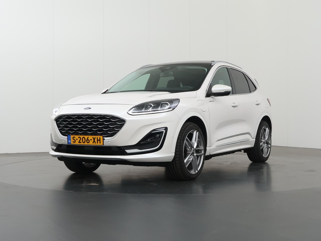 Ford Kuga - 2.5 PHEV Vignale | Panoramadak | Head-Up | Winterpakket | Parkeercamera | Cruise Control A - AutoWereld.nl