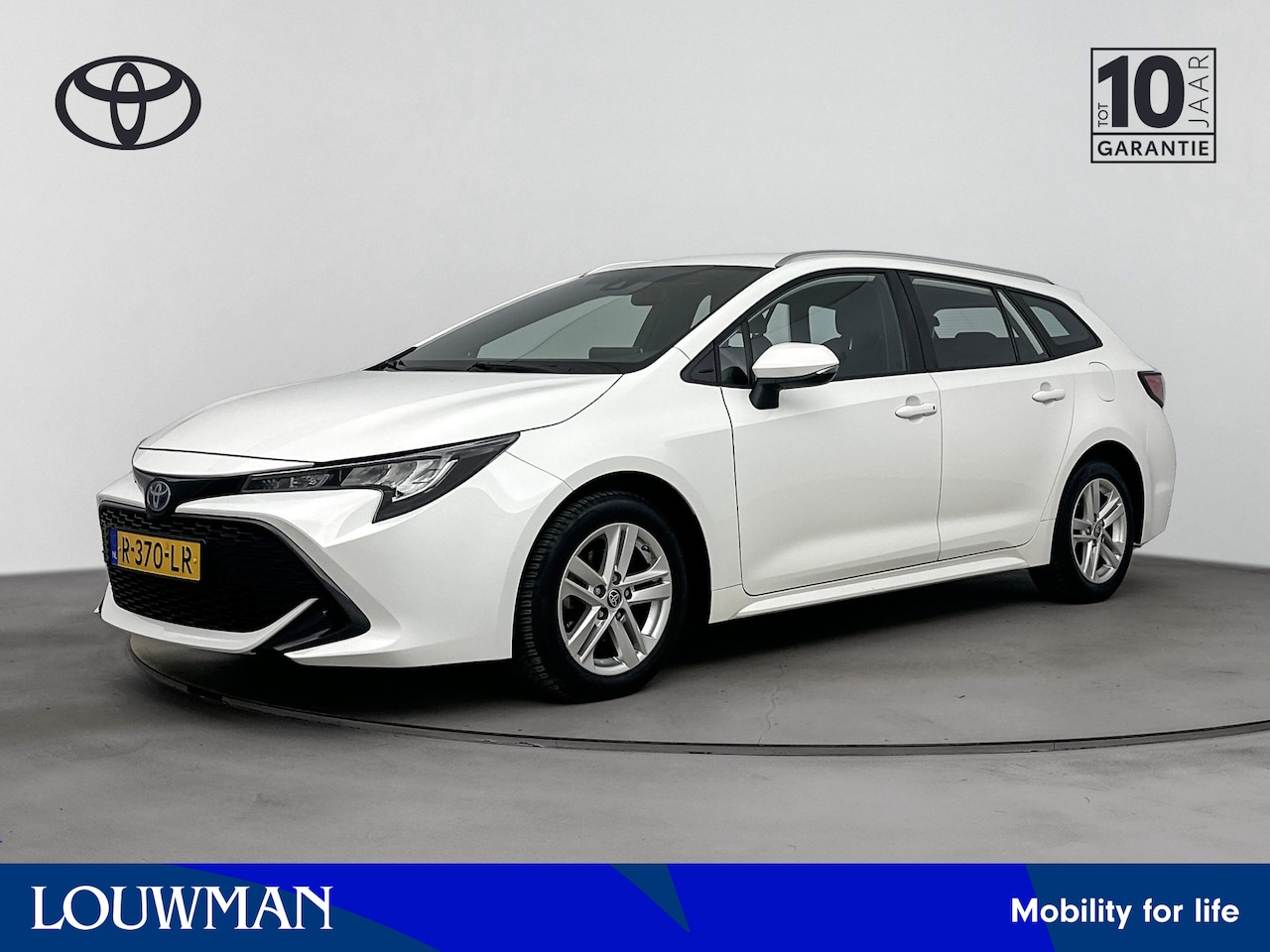 Toyota Corolla Touring Sports - 1.8 Hybrid Active | Parkeercamera | Navigatie | Climate control | Apple Carplay -/ Android - AutoWereld.nl
