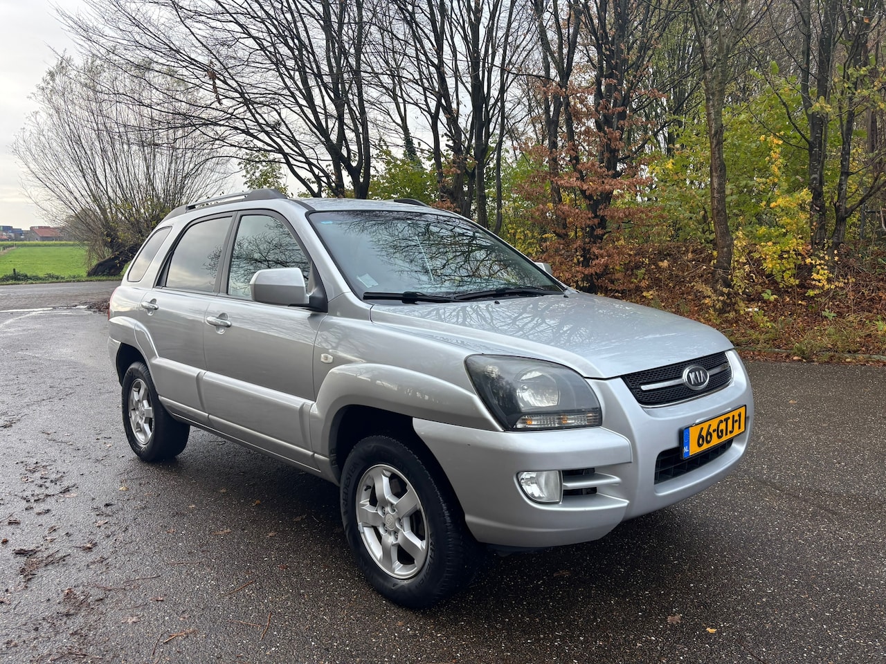 Kia Sportage - 2.0 CVVT X-ception | LPG | Leer | Clima | APK 12-2026 - AutoWereld.nl