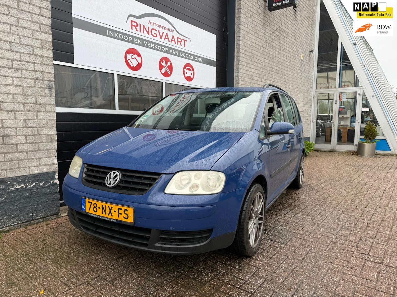 Volkswagen Touran - 1.6-16V FSI Athene 7 personen - AutoWereld.nl