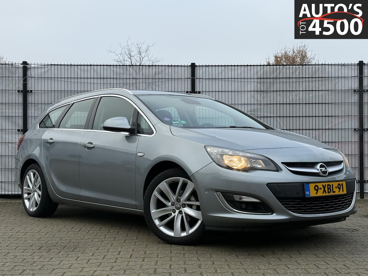 Opel Astra Sports Tourer - 1.4 Turbo Sport Trekhaak/AGR/Navi! - AutoWereld.nl
