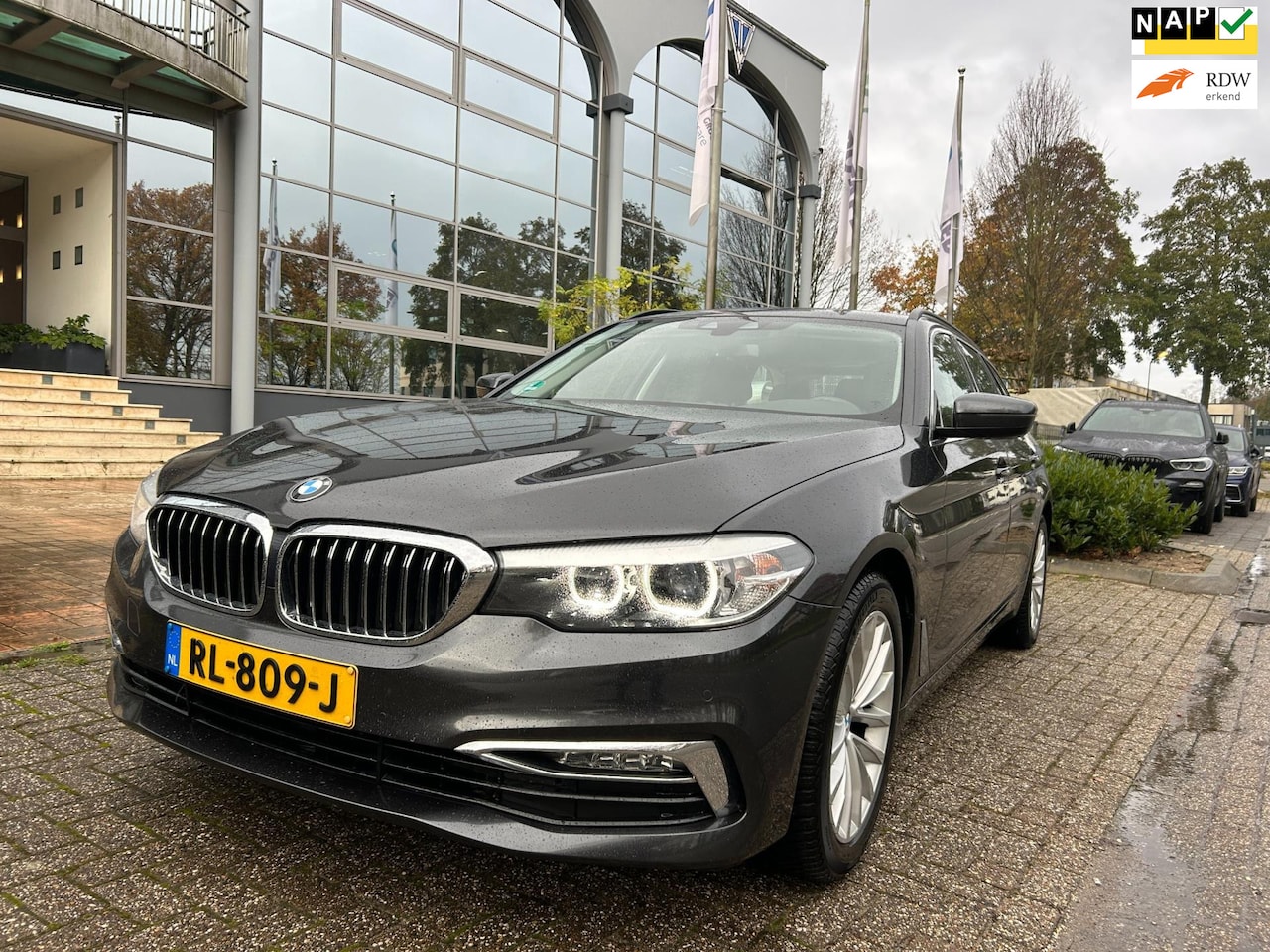 BMW 5-serie Touring - 520i Executive aut /leer/navi/ - AutoWereld.nl