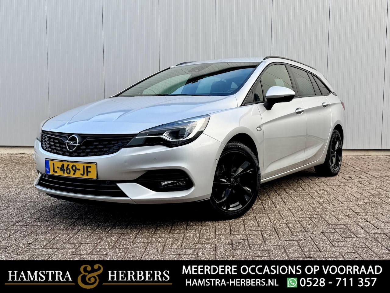 Opel Astra Sports Tourer - 1.2 Ultimate grijs - AutoWereld.nl