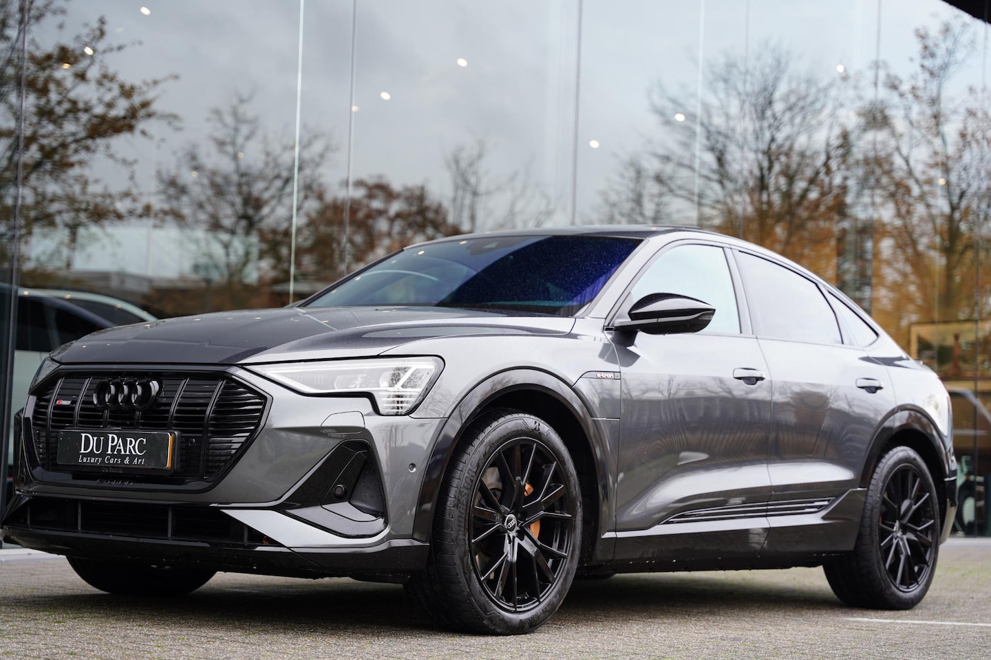 Audi e-tron Sportback - 55 Quattro S Edition 95 kWh | Panorama Dak | Black Edition | 1e Eigenaar - AutoWereld.nl