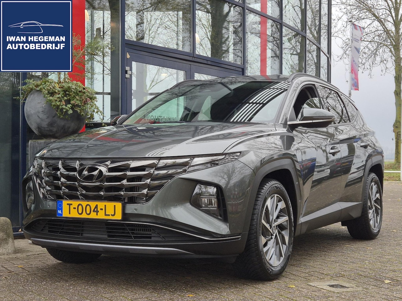 Hyundai Tucson - 1.6 T-GDI MHEV AUTOMAAT | Navigatie | Trekhaak | Parkeersensoren + Camera | Cruise Control - AutoWereld.nl