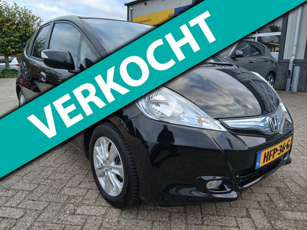 Honda Jazz - 1.4 Hybrid Elegance - Airco - Cruise Control - AutoWereld.nl