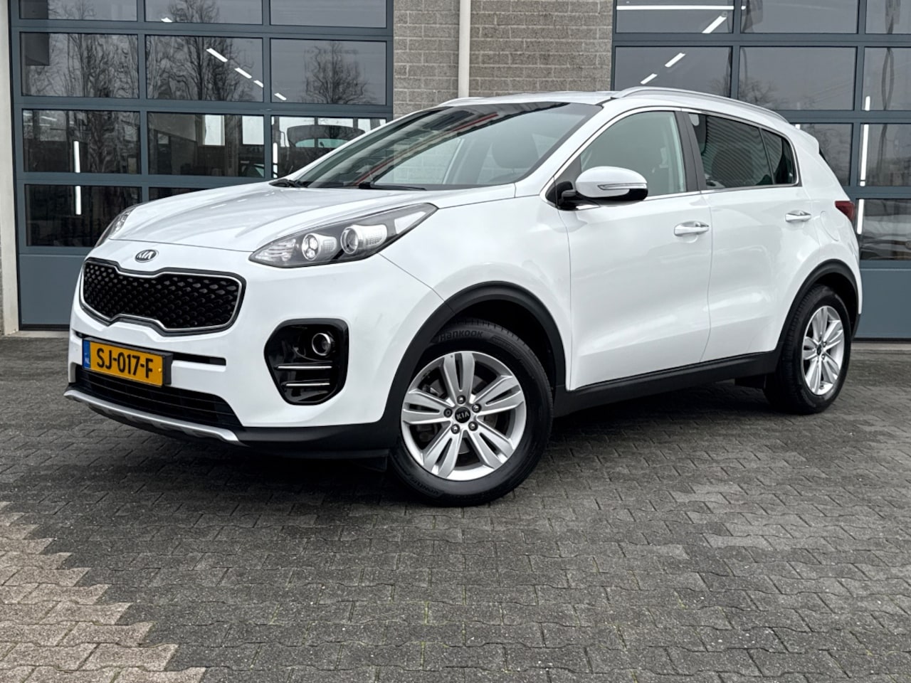 Kia Sportage - 1.6 GDI Style Edition | LEER | AFN. TREKHAAK | - AutoWereld.nl