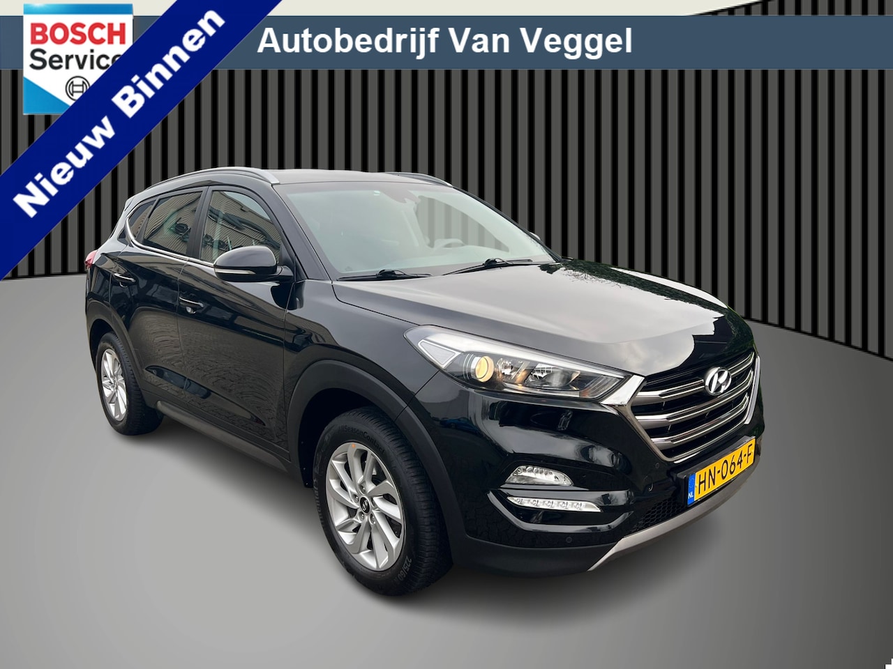 Hyundai Tucson - 1.6 GDi navi, cruise, camera, trekhaak, stoelverw - AutoWereld.nl
