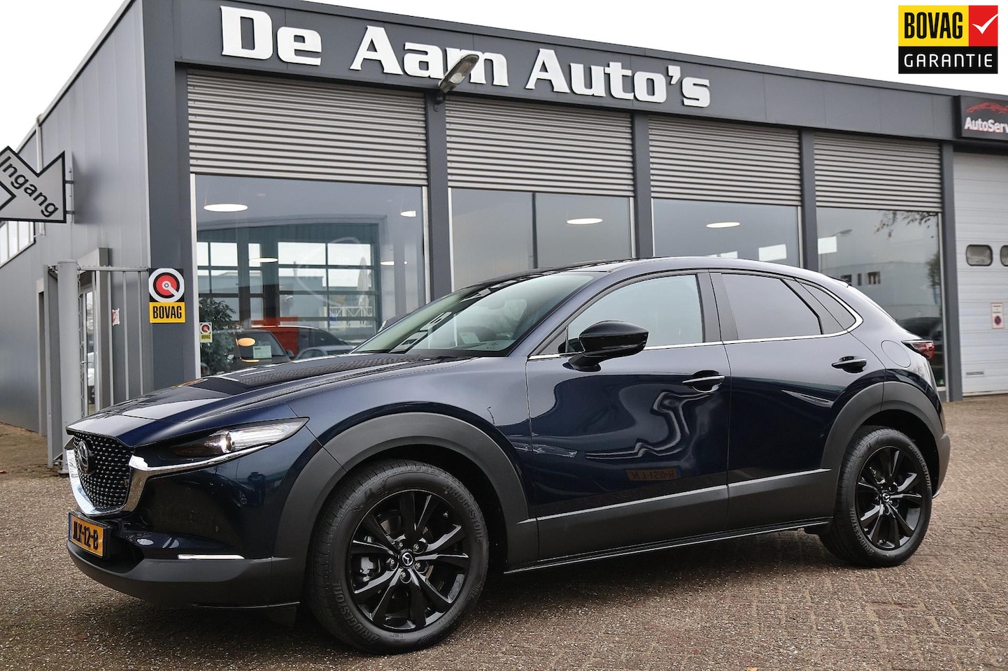 Mazda CX-30 - 2.5 e-SkyActiv-G M Hybrid Homura Camera adaptive Carplay - AutoWereld.nl