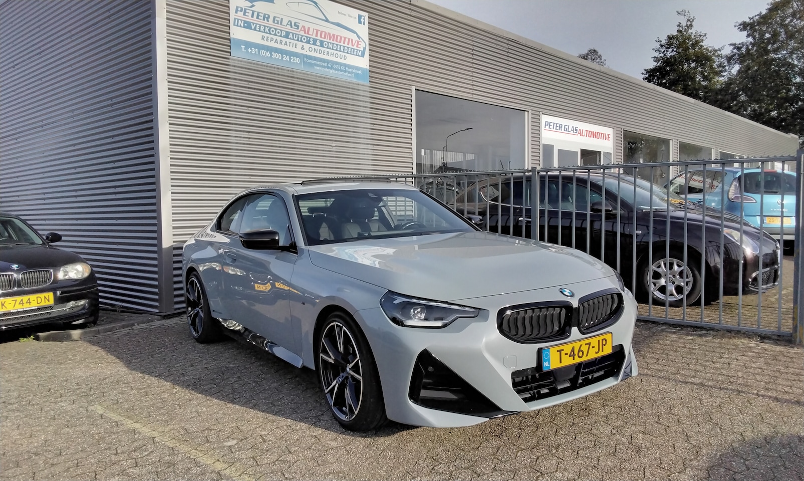 BMW 2-serie Coupé - 220i High Executive - AutoWereld.nl