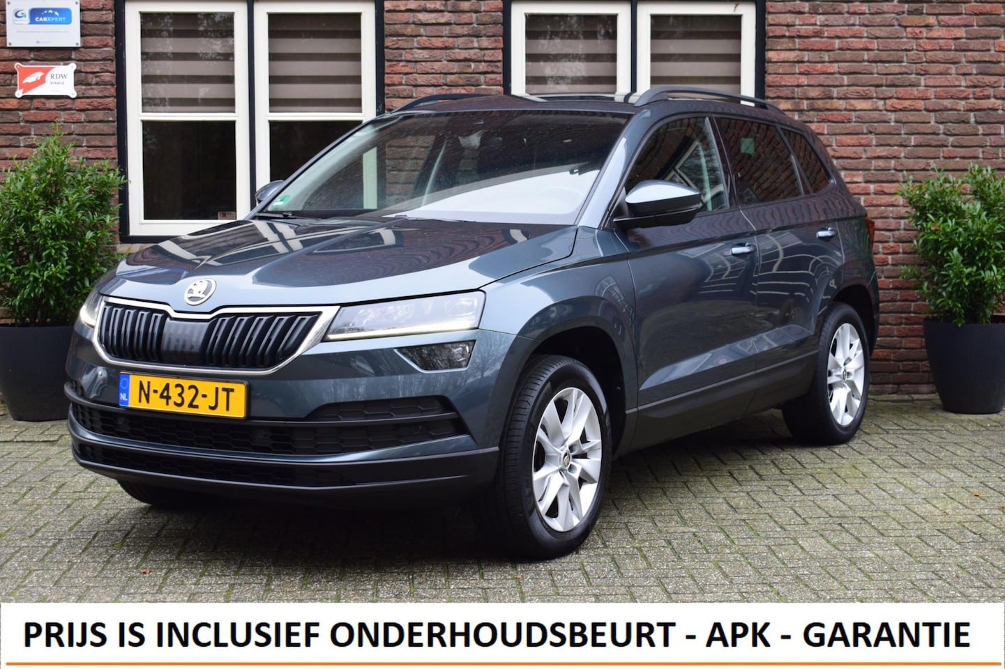 Skoda Karoq - 1.0 TSI Business Ed. Trekhaak| Adapt. Cruise | Stoelverwarming - AutoWereld.nl
