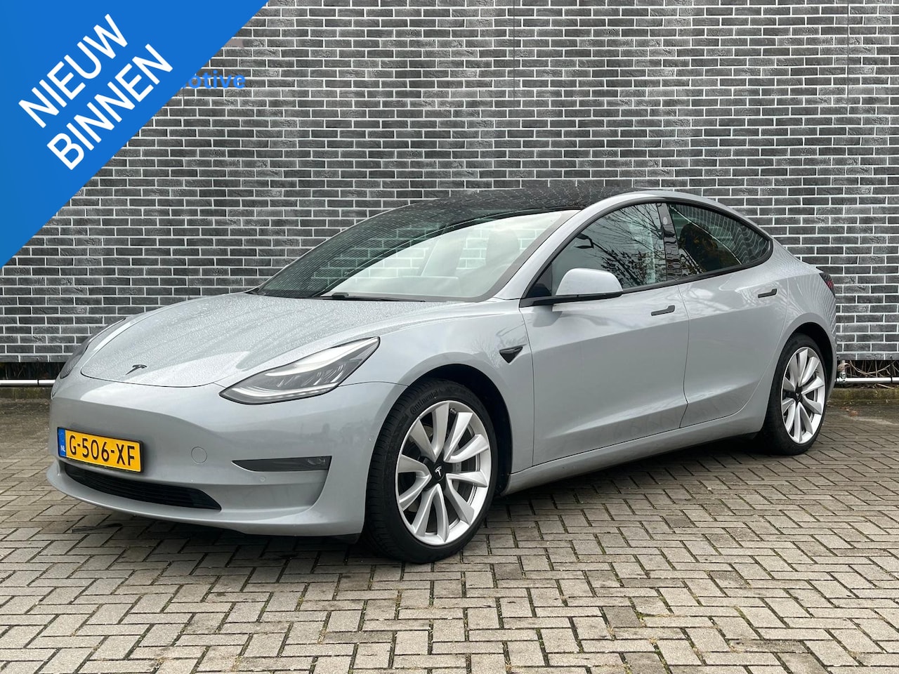 Tesla Model 3 - Long Range RWD Long Range AWD 75 kWh | Unieke Wrap | Dual Motor | Trekhaak | - AutoWereld.nl