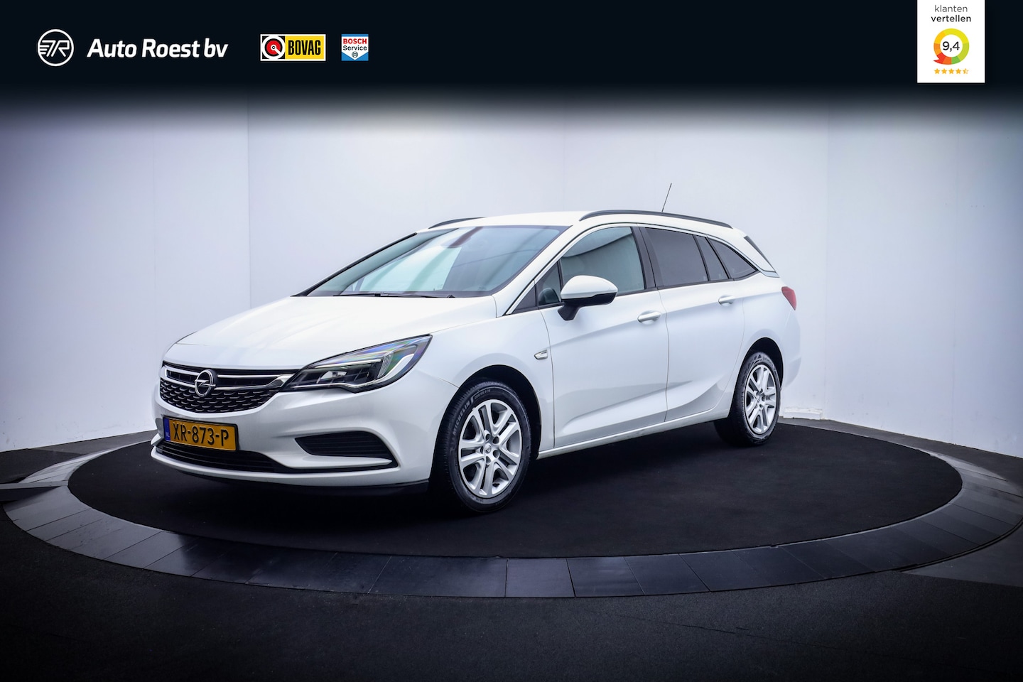 Opel Astra Sports Tourer - 1.4T 150Pk Aut. Business+ CARPLAY | NAVI | TREKHAAK | PDC | CRUISE | DAB | CLIMA - AutoWereld.nl