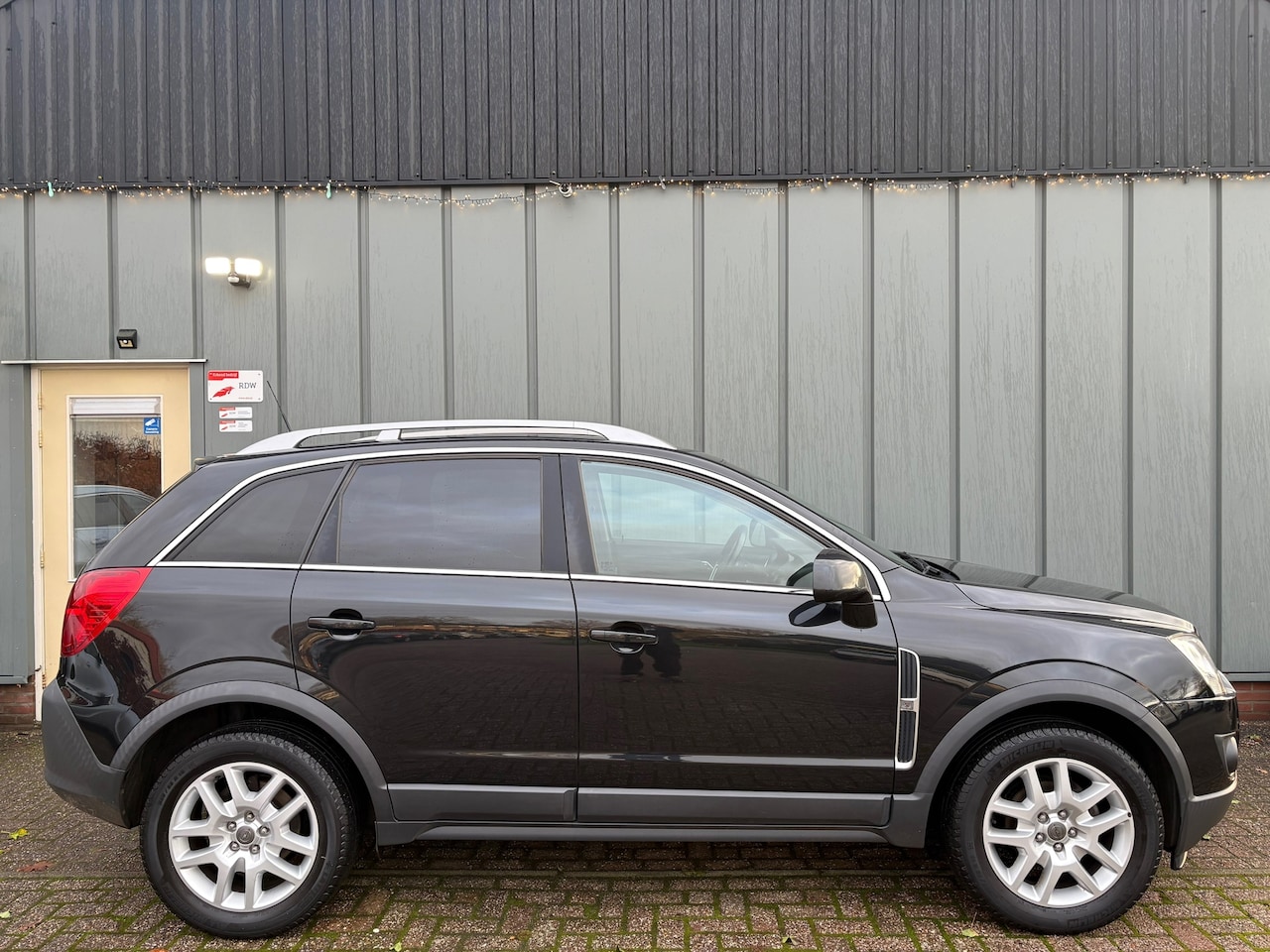 Opel Antara - 2.4-16V Edition 2x4 NAP//AIRCO//CRUISE//TREKHAAK//6BAK//STOELVERW.