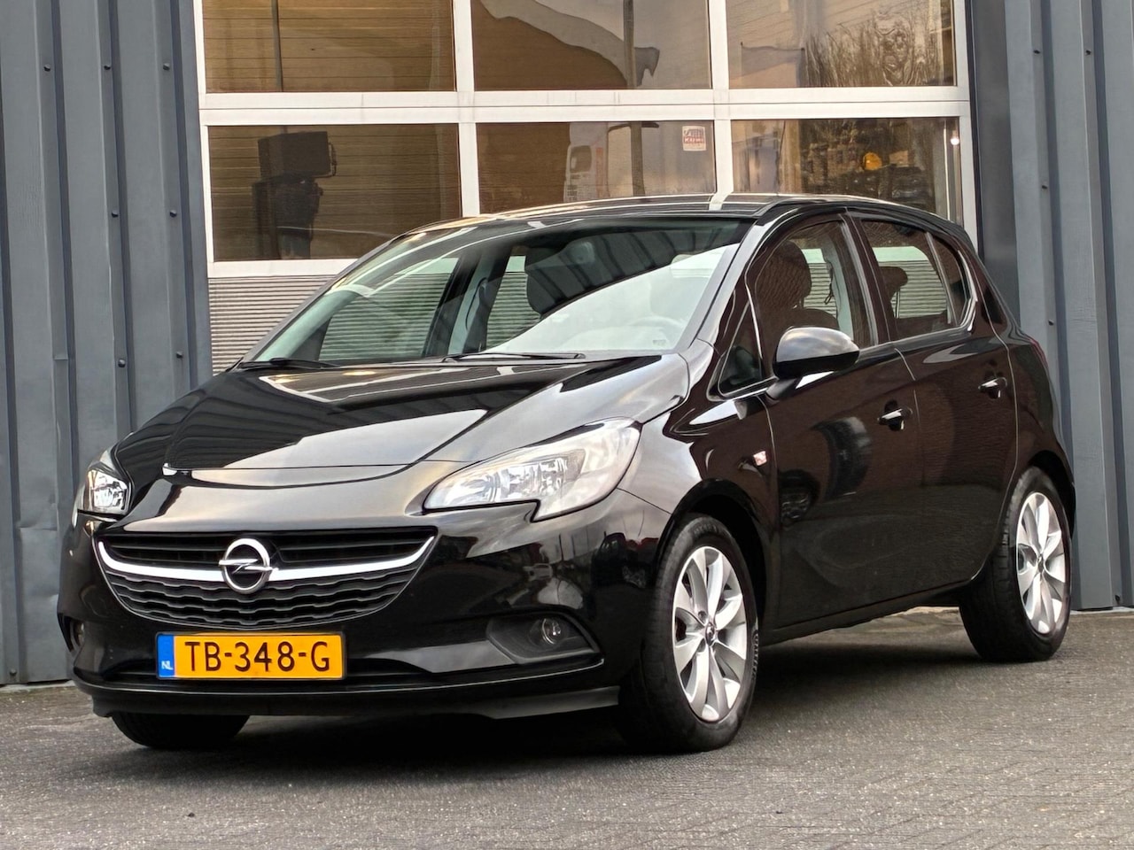 Opel Corsa - 1.4 Favourite Airco Pdc Dealer onderhouden - AutoWereld.nl