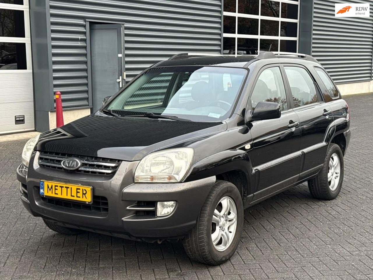 Kia Sportage - 2.0 CVVT Executive 2.0 CVVT Executive, airco, trekhaak - AutoWereld.nl