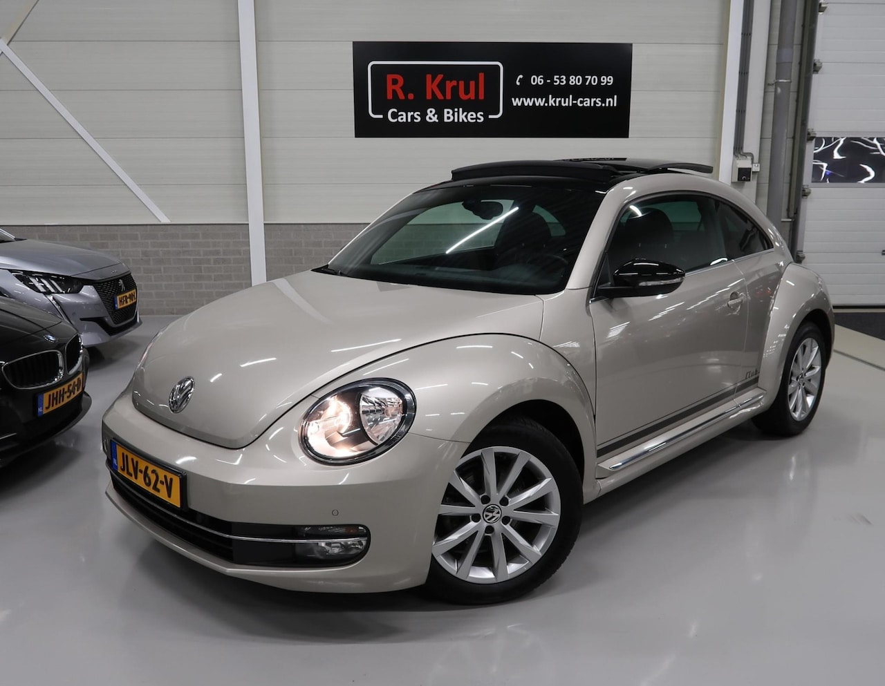 Volkswagen Beetle - 1.4 TSI Club BMT Automaat DSG Panoramadak Navigatie Airco-ecc Flippers PDC Cruise Stoelver - AutoWereld.nl