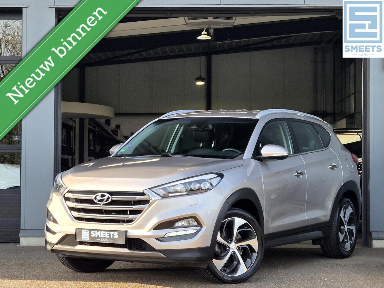Hyundai Tucson - 1.6 GDi Premium |Leer|Navi|Cam|Clima|Cruise - AutoWereld.nl