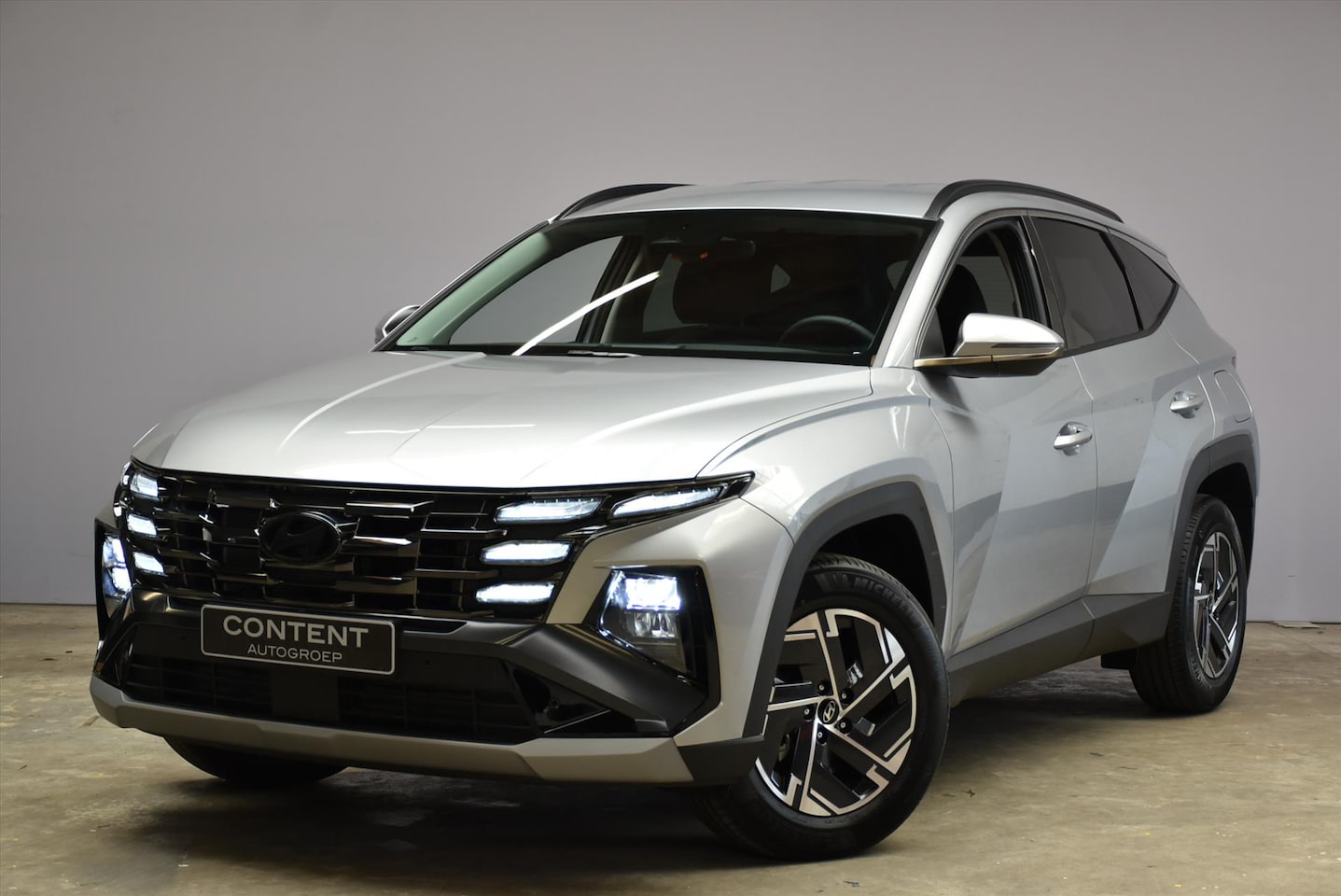 Hyundai Tucson - 1.6 T-GDi HEV Aut. Comfort Smart I Demo voordeel! - AutoWereld.nl