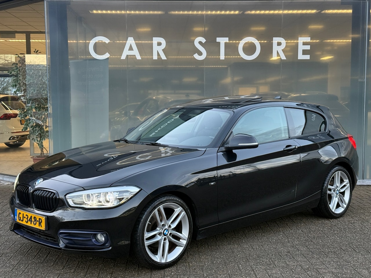 BMW 1-serie - 116d EDE Sport Schuifdak Navi PDC LED - AutoWereld.nl