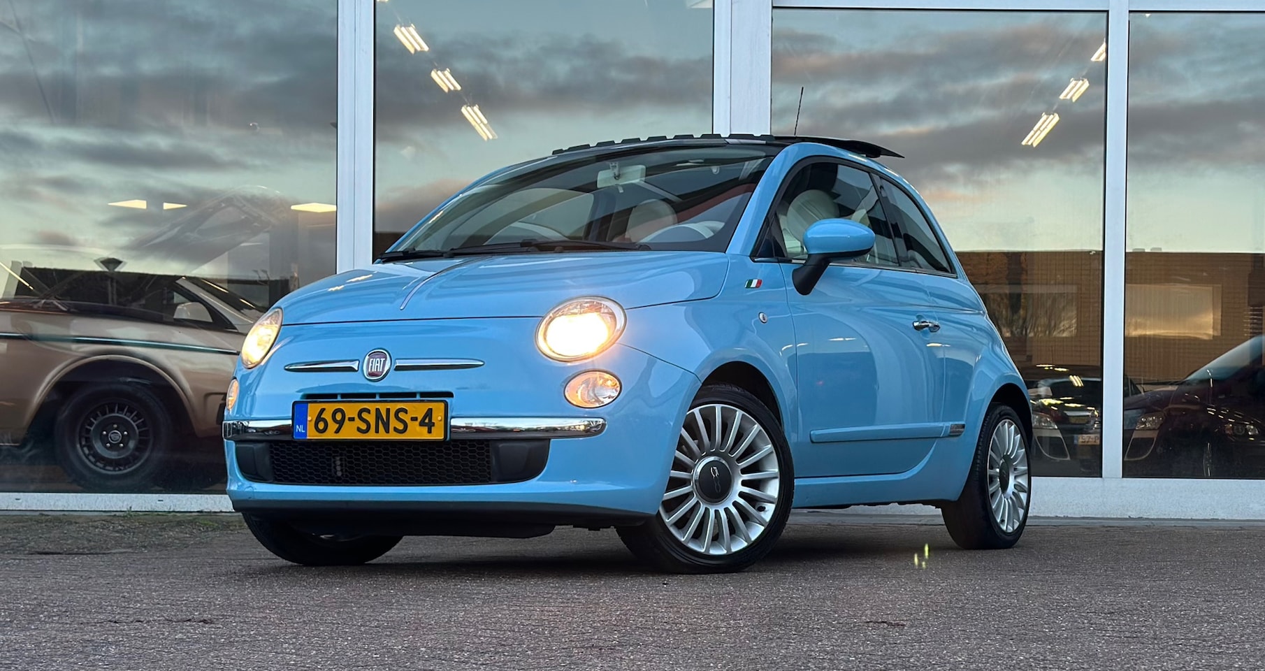 Fiat 500 - 1.2 Lounge 1e Eigenaar Schuif/kanteldak Winterbanden extra - AutoWereld.nl