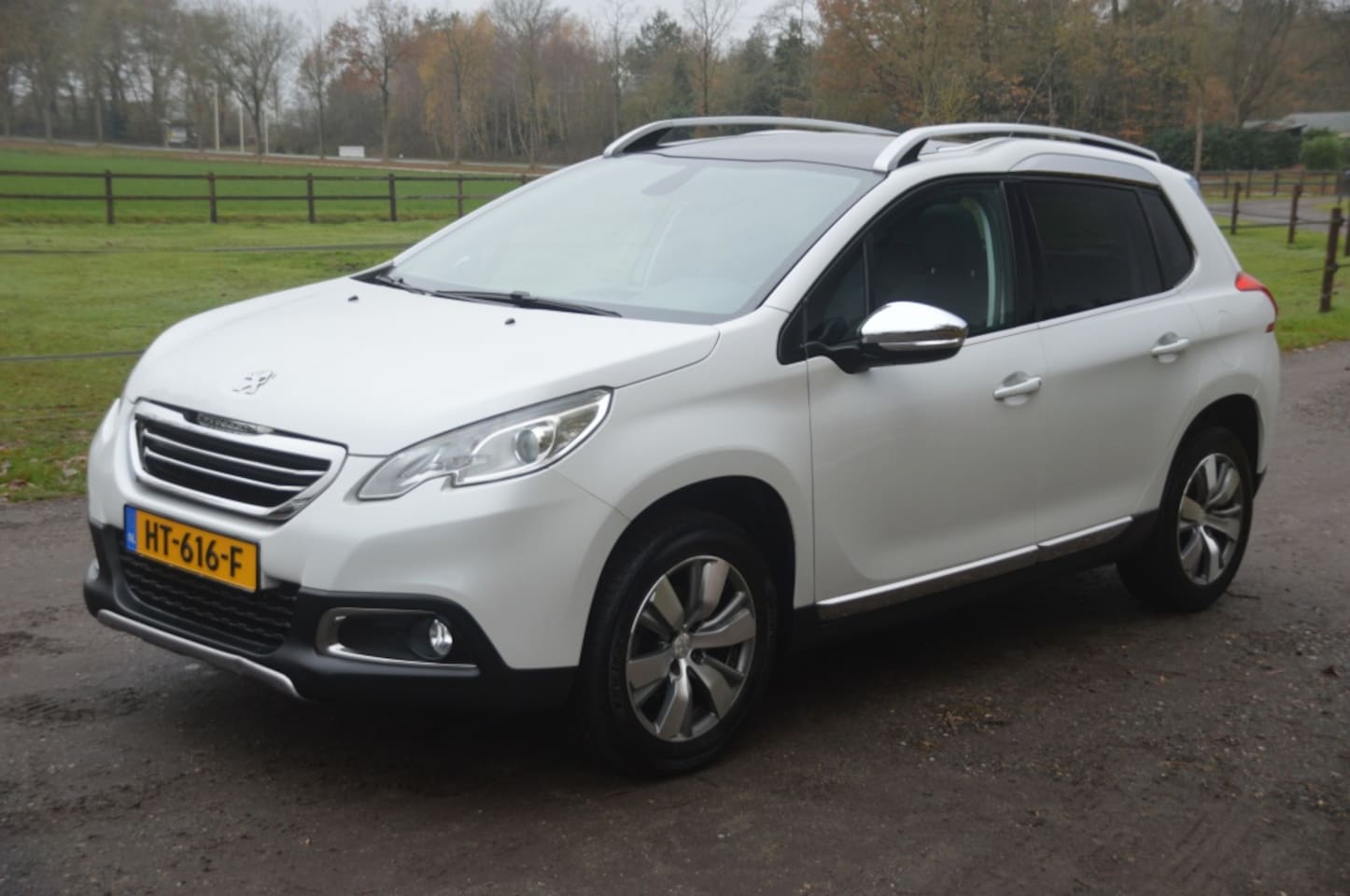 Peugeot 2008 - 1.2 PureTech Allure Clima Cruise Panodak Navi - AutoWereld.nl