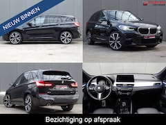 BMW X1 - sDrive18i High Executive * M-PAKKET * 20 INCH * HEAD-UP * DEALER ONDERH