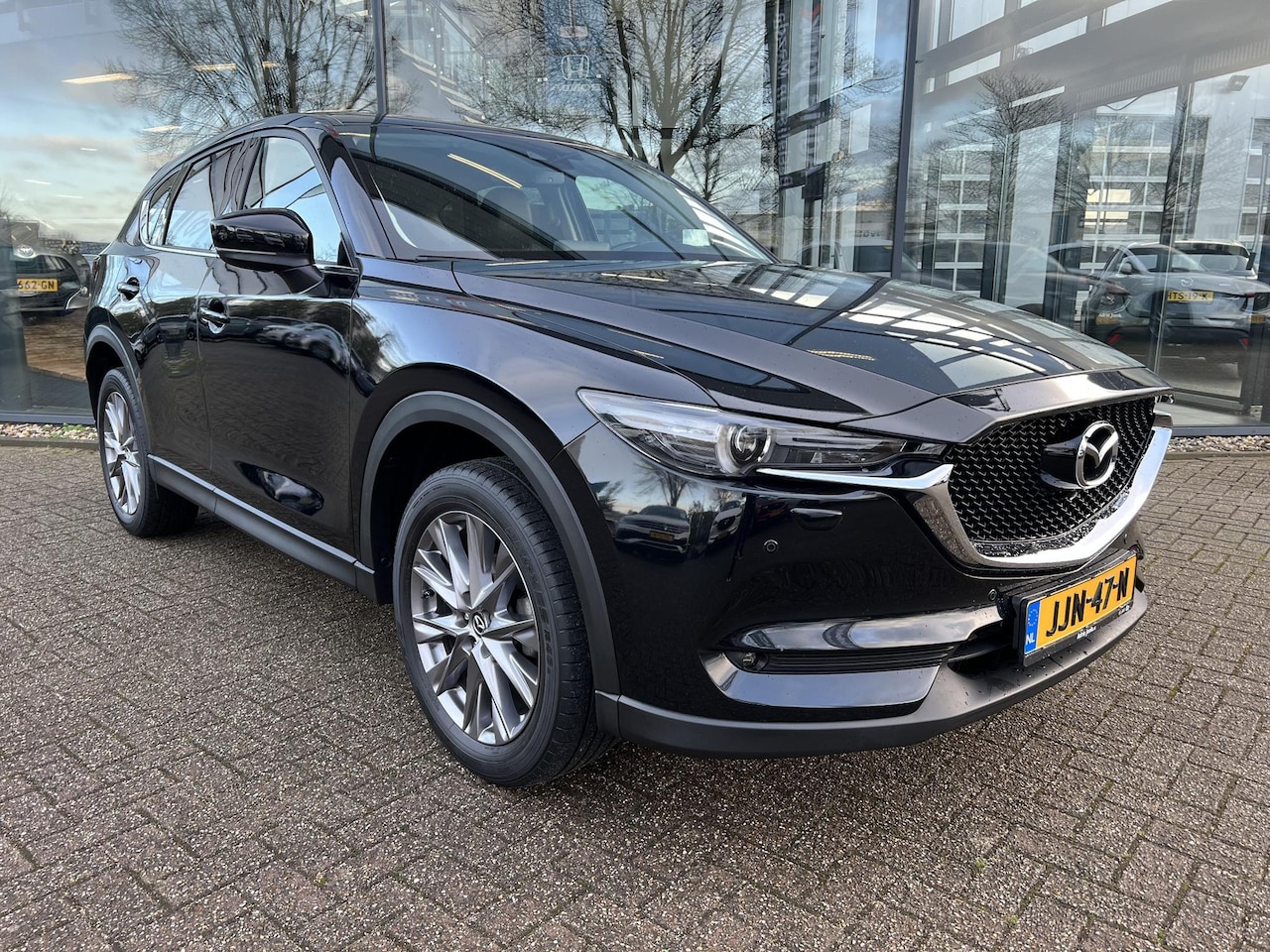 Mazda CX-5 - 2.0 SkyActiv-G 165 Luxury | TREKHAAK | HEAD-UP DISPLAY | LEDER | BOSE | 360 CAMERA | 19' L - AutoWereld.nl