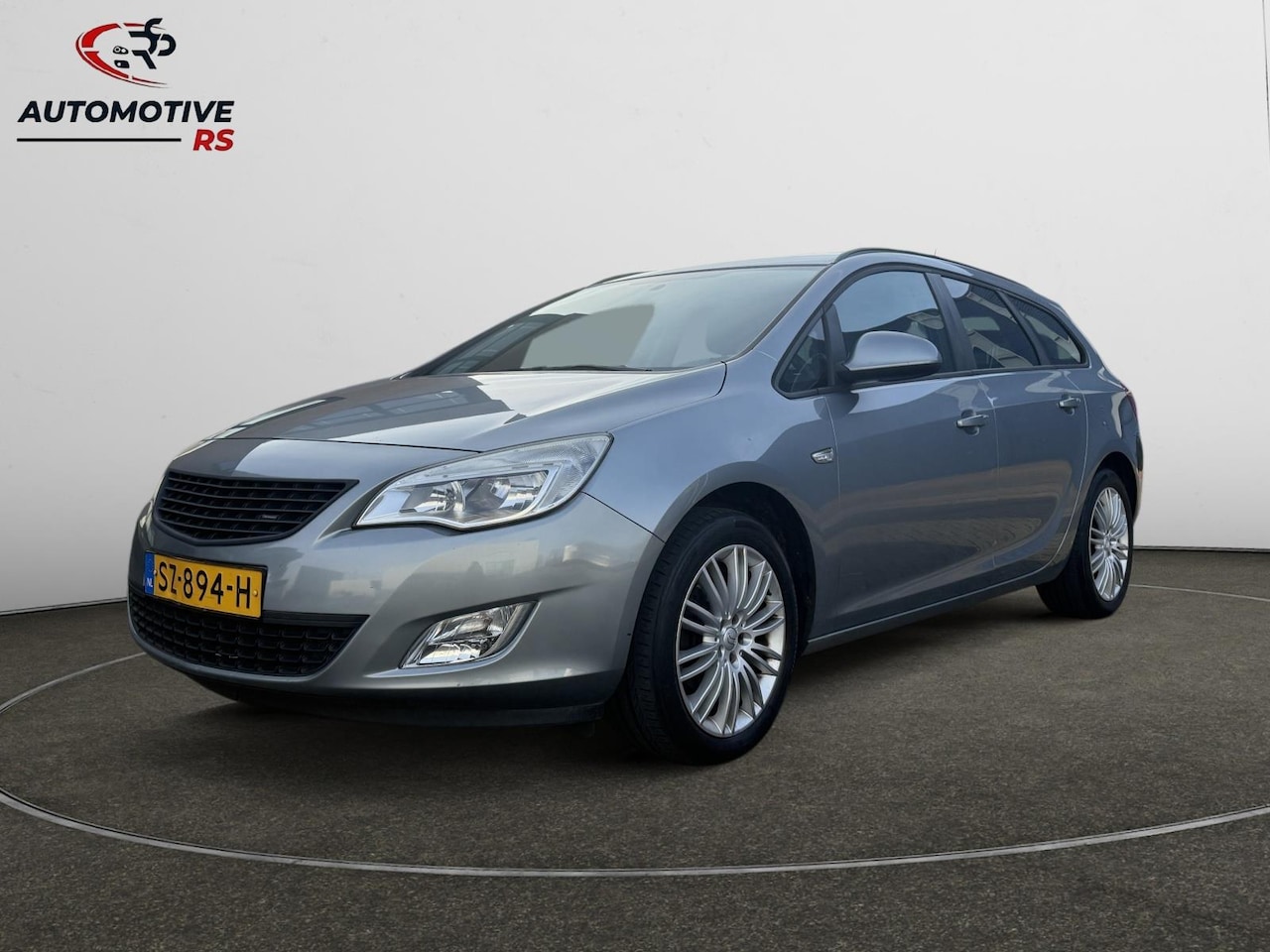 Opel Astra Sports Tourer - 1.4 Turbo Sport Airco Pdc Cruise Led Climate Bluetooth LMV Comfort Stoelen Nette Auto - AutoWereld.nl