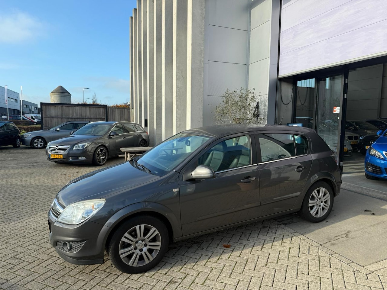 Opel Astra - 1.6 Cosmo LEER! NAVI! TREKHAAK! INRUIL MOGELIJK! - AutoWereld.nl