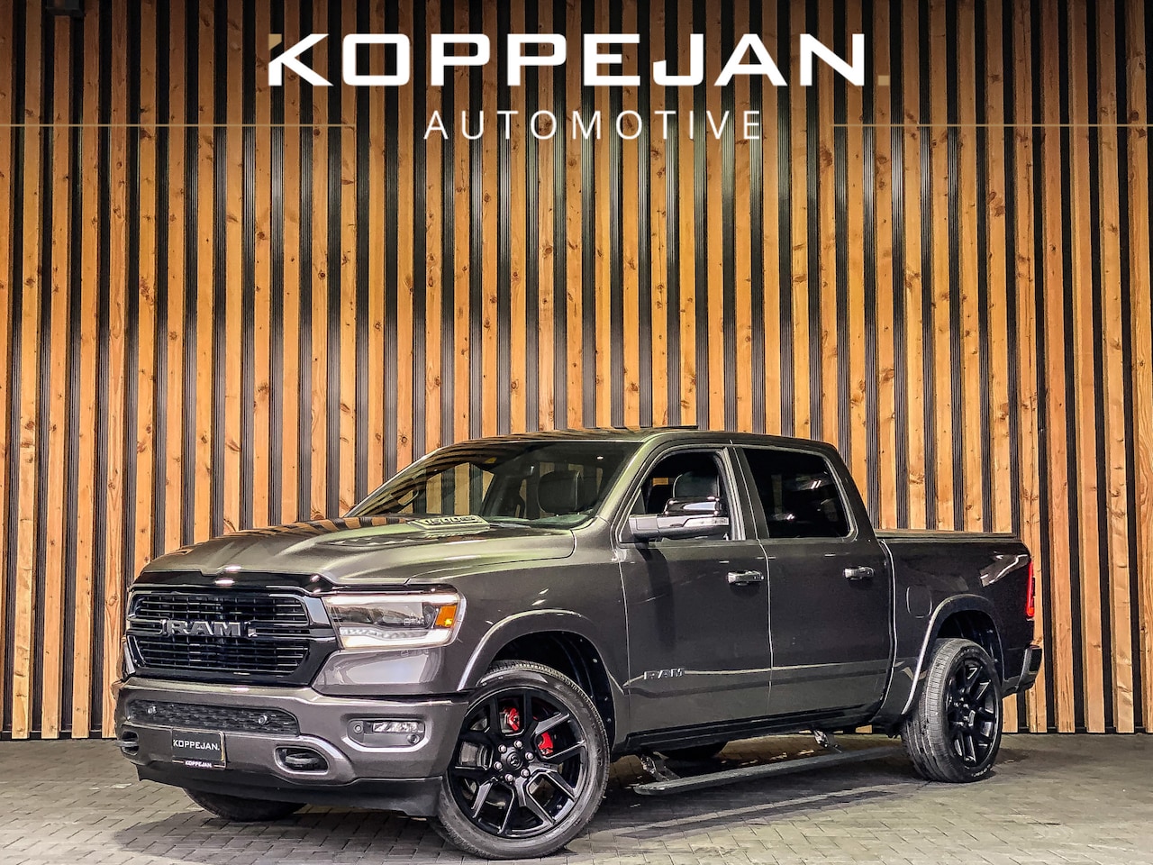 Dodge Ram 1500 - 5.7 V8 402PK 4x4 Crew Cab Laramie | PANORAMADAK | LUCHTVERING | LPG | STOELVERWARMING | ST - AutoWereld.nl