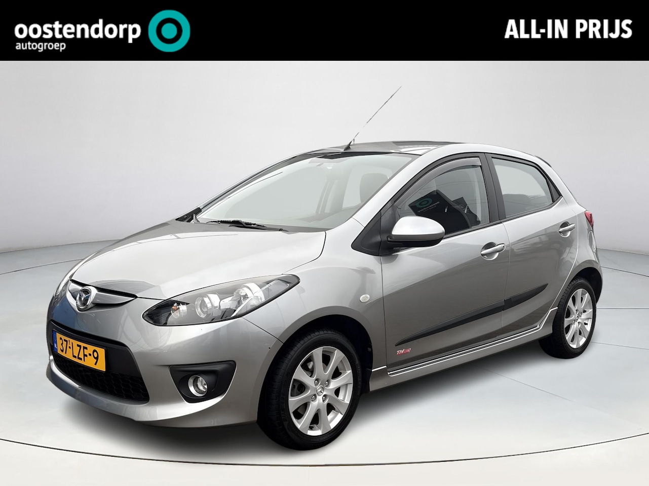 Mazda 2 - 1.3 GT-M Line | Rijklaarprijs! | Airco | CD-speler | Lichtmetalen velgen | Incl 12 mnd gar - AutoWereld.nl