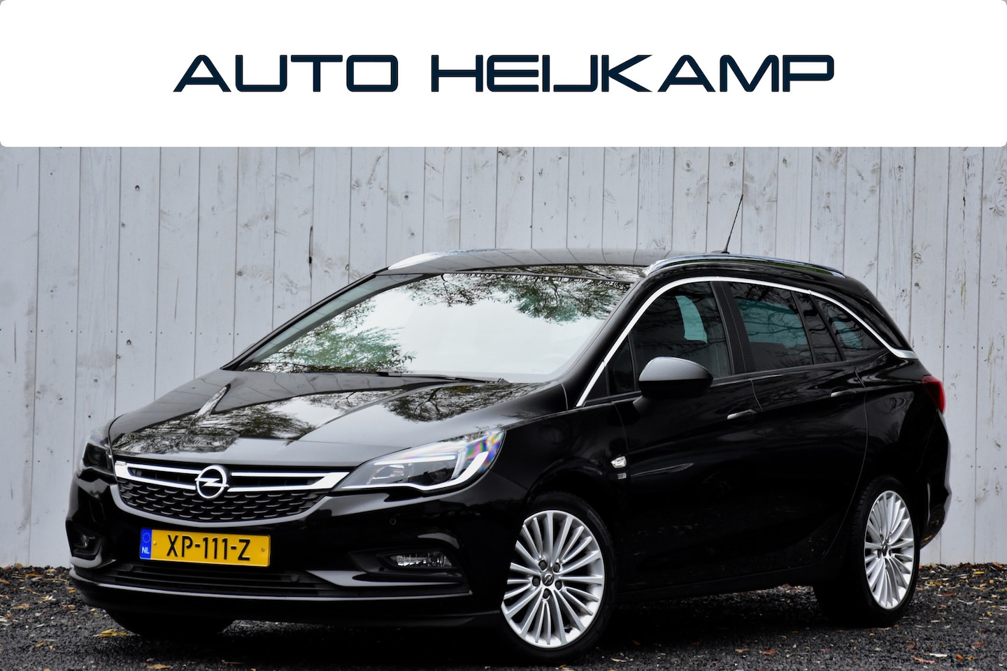 Opel Astra Sports Tourer - 1.4 Turbo 120 Jaar Edition | Navi | 90.760km | NL-Auto | - AutoWereld.nl