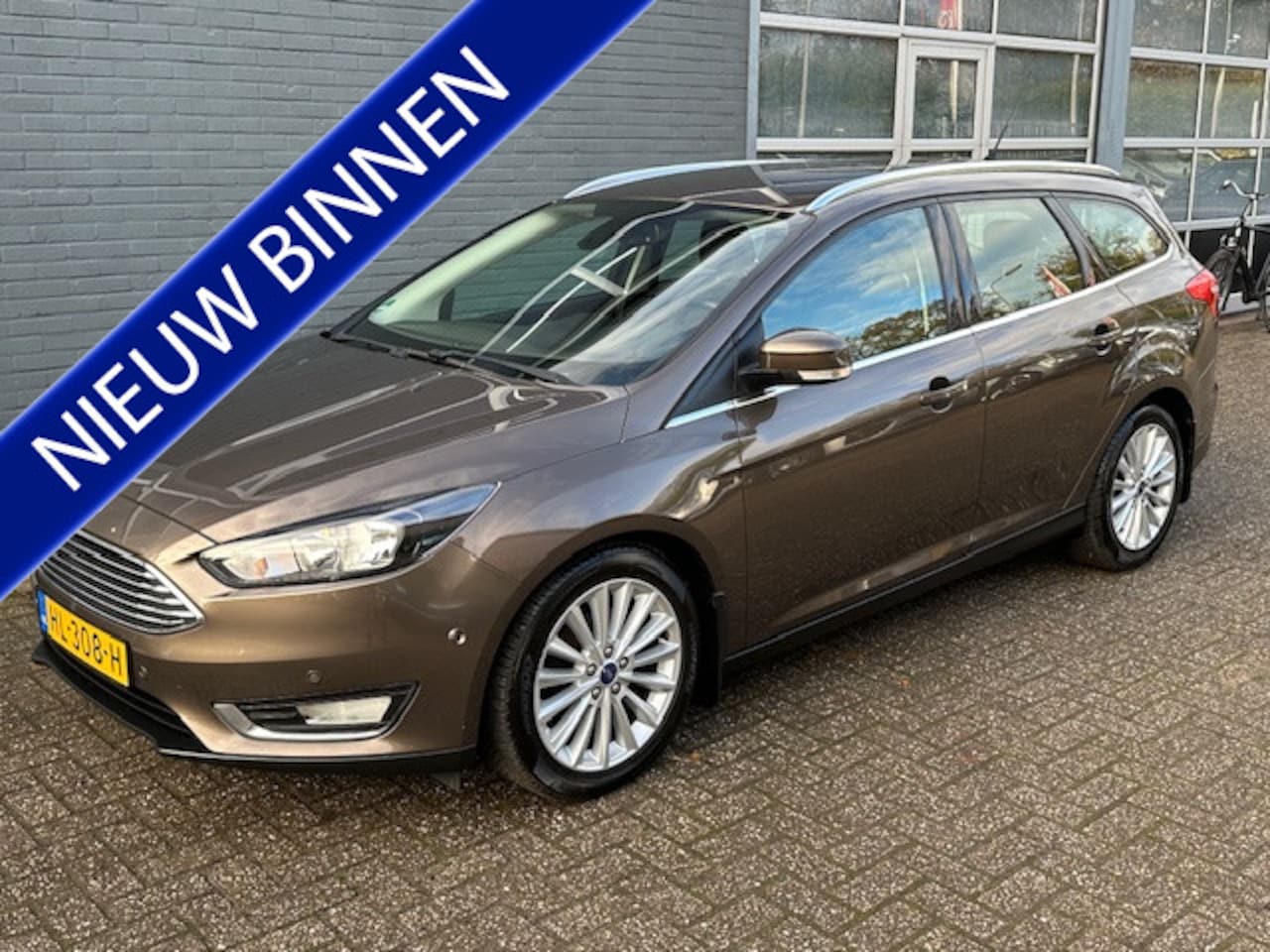 Ford Focus Wagon - 1.5 TDCI Titanium Edition / trekhaak - AutoWereld.nl