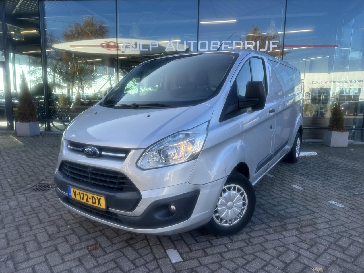 Ford Transit Custom - 330 2.2 TDCI L2H1 Ambiente Airco - AutoWereld.nl