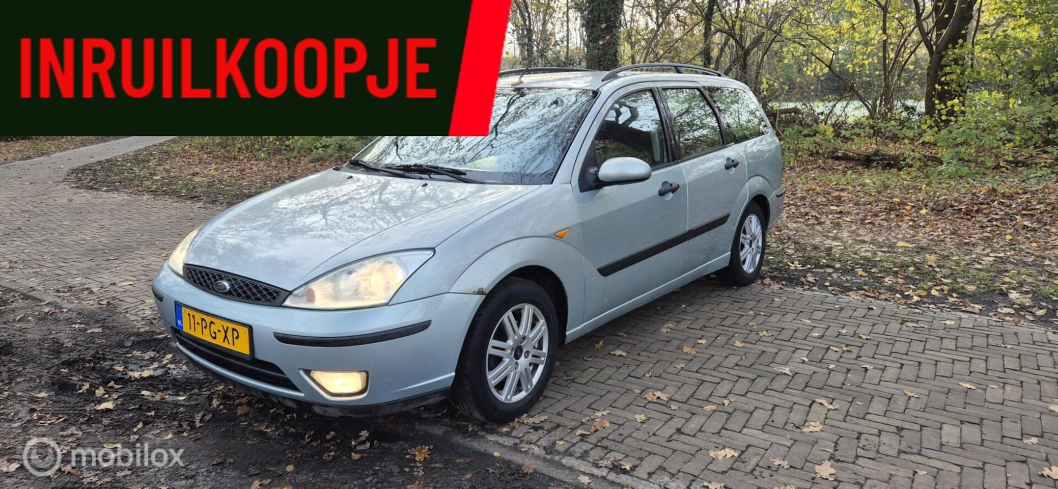 Ford Focus Wagon - 1.6-16V Ghia 1.6-16V Ghia - AutoWereld.nl