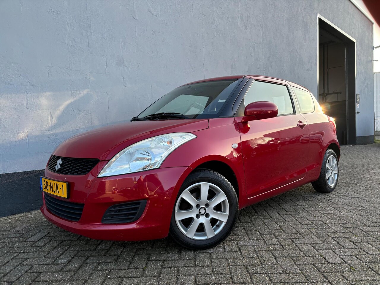 Suzuki Swift - 1.2 Comfort - Airco - Elek. Kantel/Schuif Dak - LMV - AutoWereld.nl