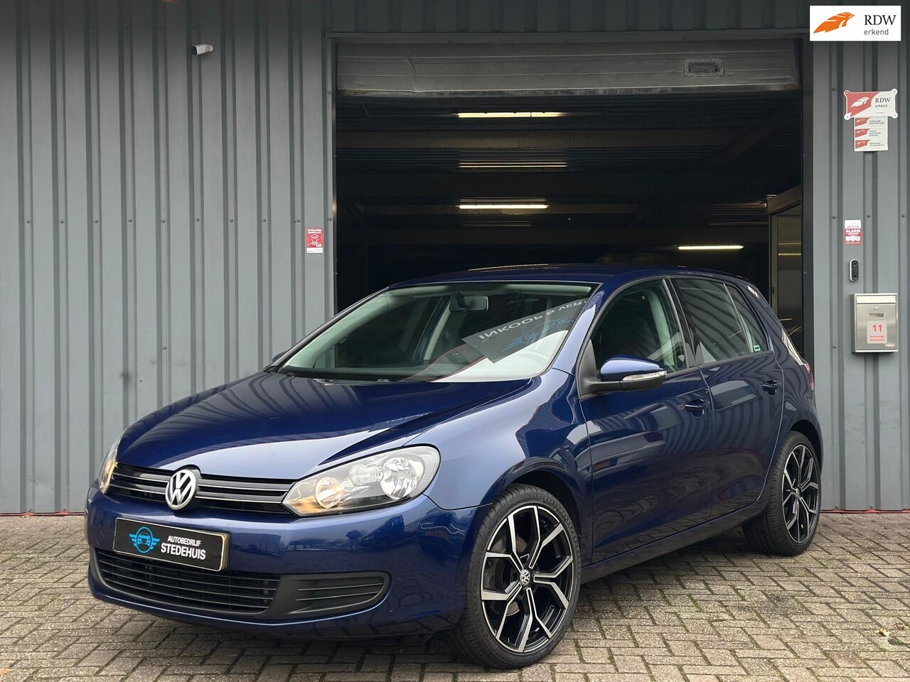 Volkswagen Golf - 1.2 TSI Comfortline BlueMotion Navi | 18 inch - AutoWereld.nl