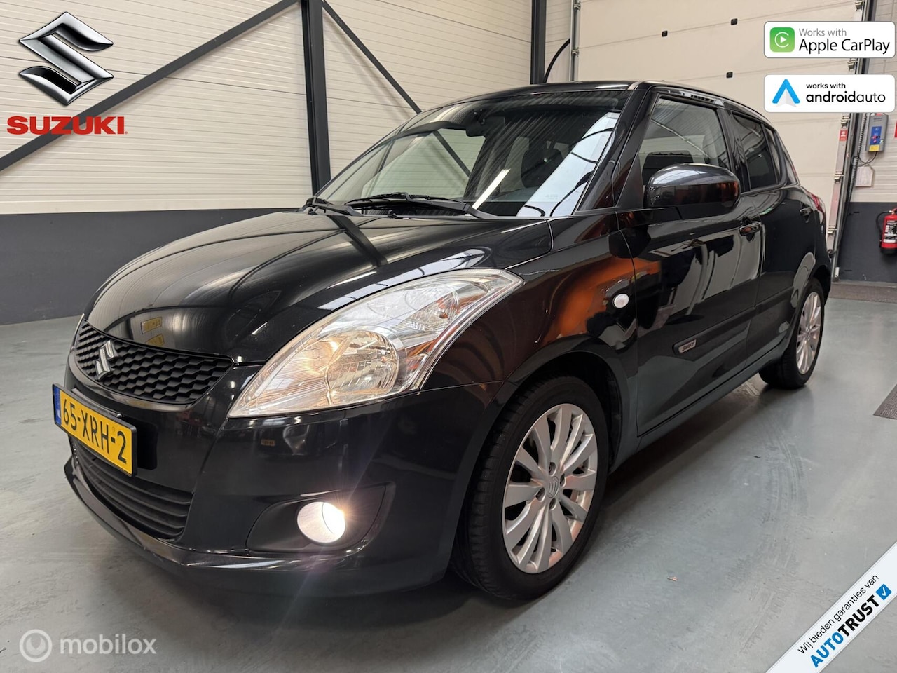 Suzuki Swift - 1.2 Exclusive Carplay|Clima|Cruise|NL-Auto! - AutoWereld.nl
