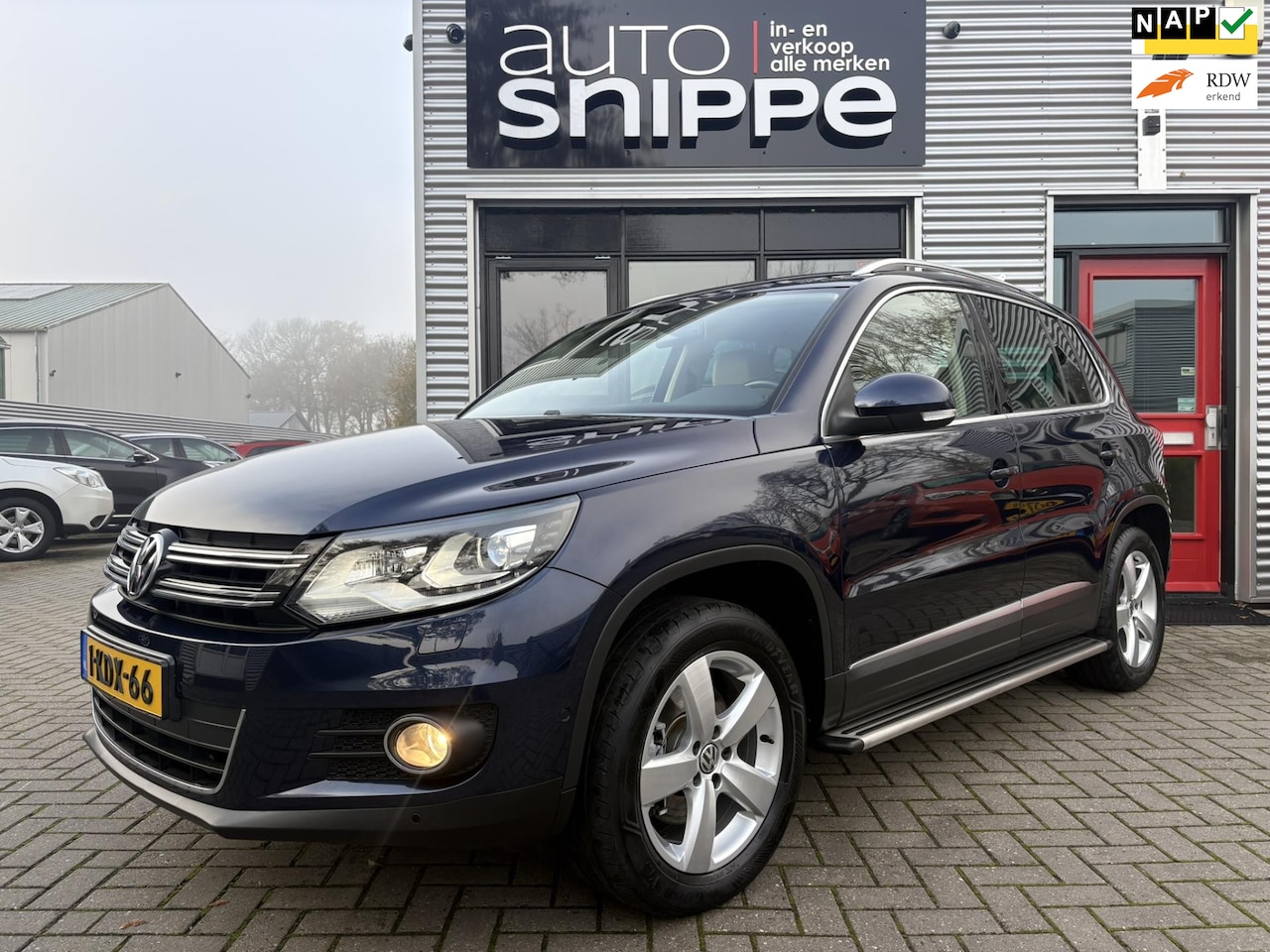 Volkswagen Tiguan - 1.4 TSI Sport&Style -160 PK!-VOLLEDER-STOELVERWARMING-XENON-TREKHAAK-1800 KG TREKGEWICHT-K - AutoWereld.nl