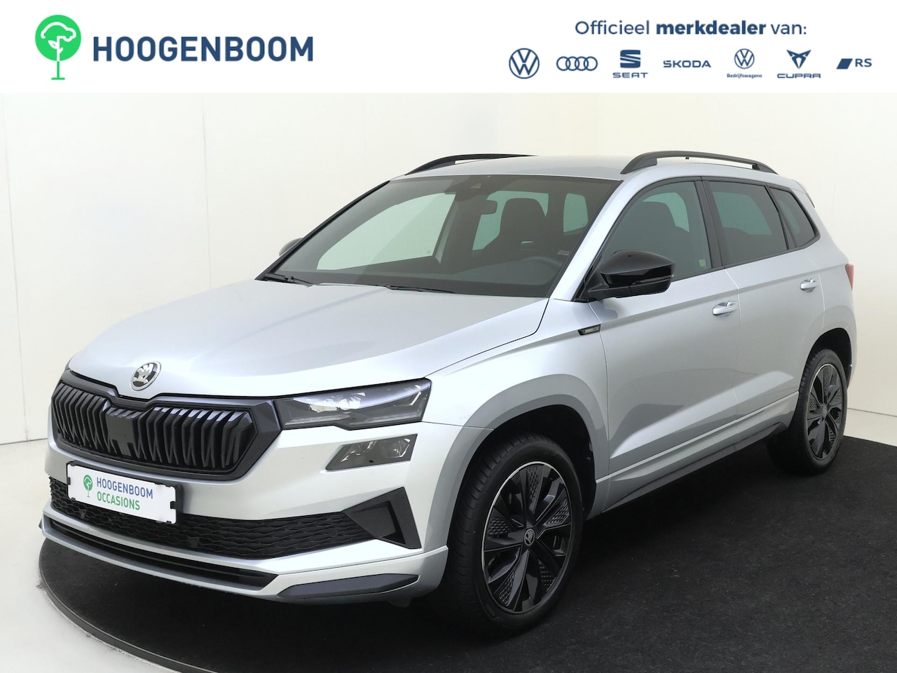 Skoda Karoq - 1.5 TSI ACT Sportline Business | Trekhaak | Achteruitrijcamera | Keyless | Adaptieve cruis - AutoWereld.nl