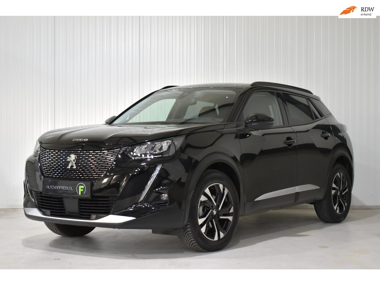 Peugeot 2008 - 1.2 PureTech Allure | 1E EIG | DEALER | CARPLAY | VIRTUAL | GROOT NAVI | SPORTSTOELEN - AutoWereld.nl