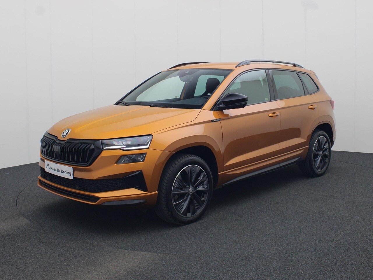 Skoda Karoq - 1.5TSI/150PK ACT Sportline DSG · Navigatie · Trekhaak · Apple/Android Car Play · Camera · - AutoWereld.nl