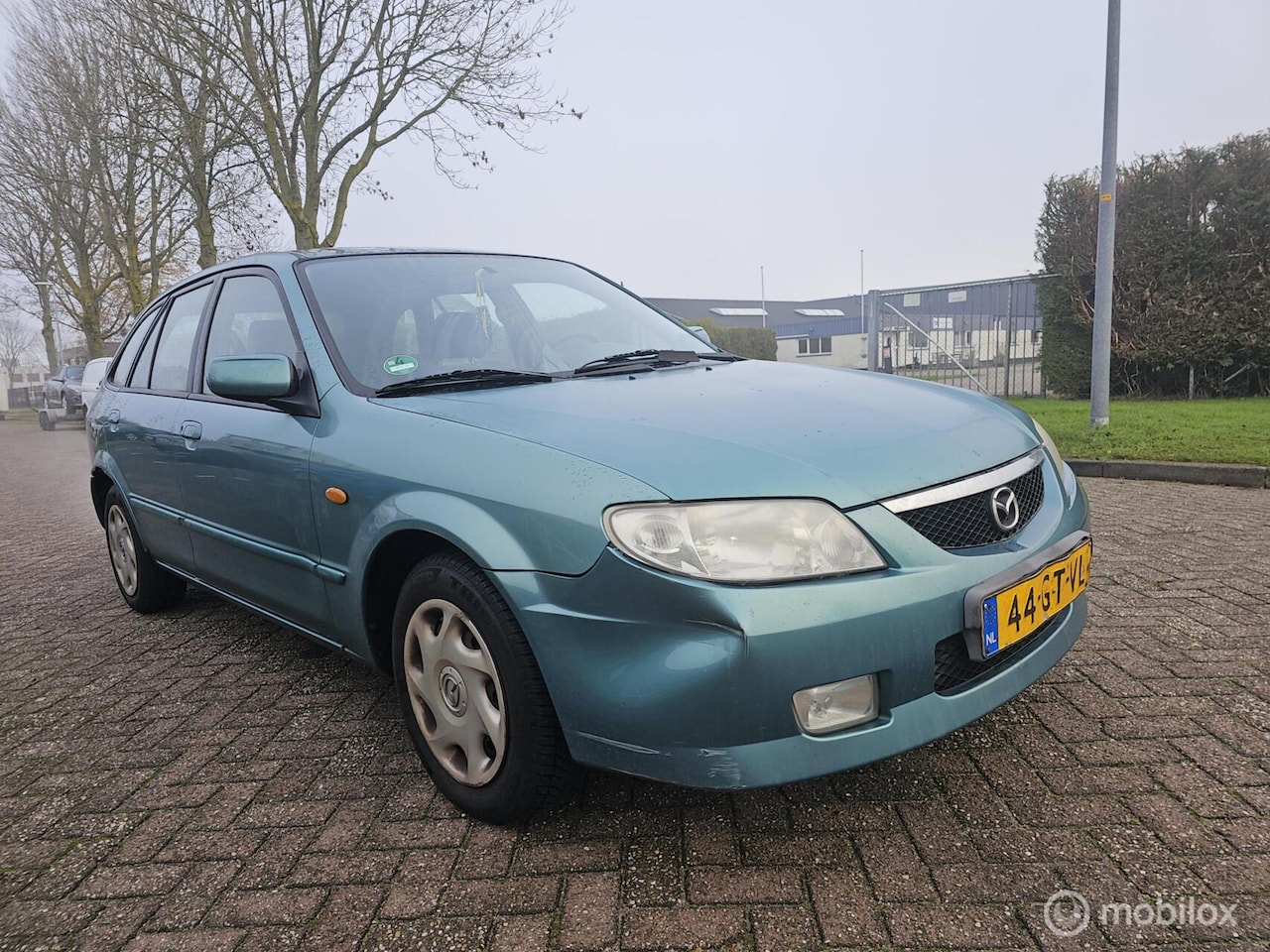 Mazda 323 - 1.6i F LX 1.6i F LX - AutoWereld.nl