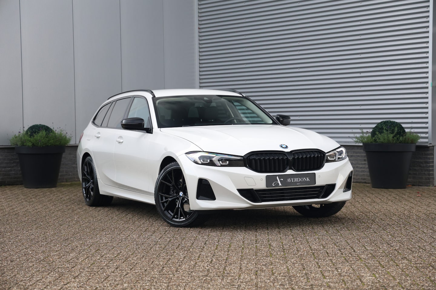 BMW 3-serie Touring - 320e Executive Sport NAP|Sportst|Leder|Carplay|Curved|LCI - AutoWereld.nl