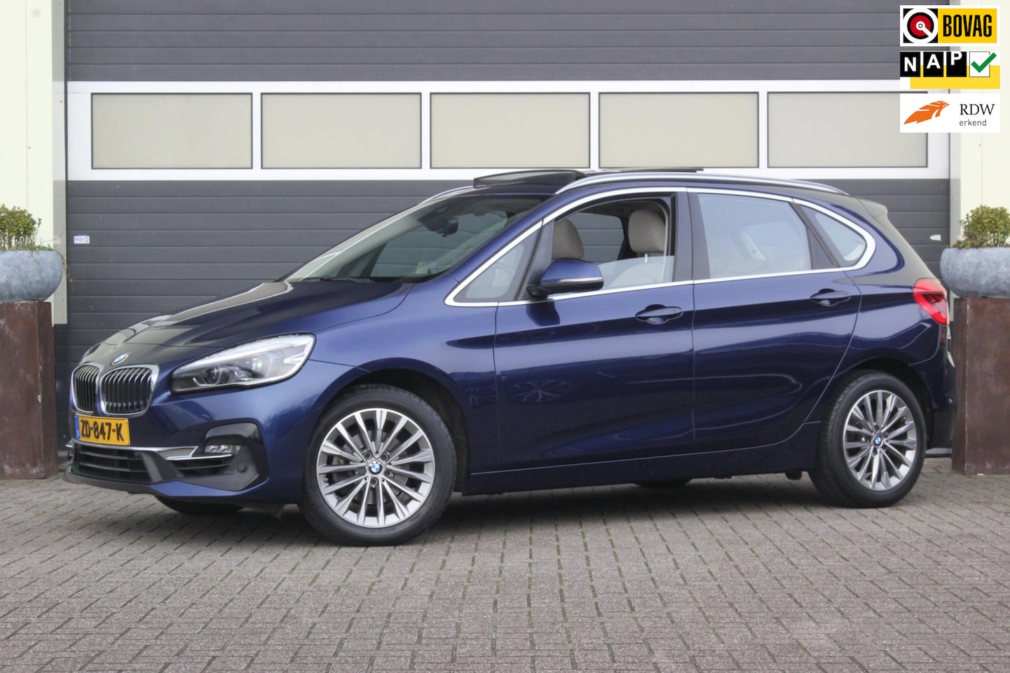 BMW 2-serie Active Tourer - 218i High Executive | Trekhaak | Camera | - AutoWereld.nl